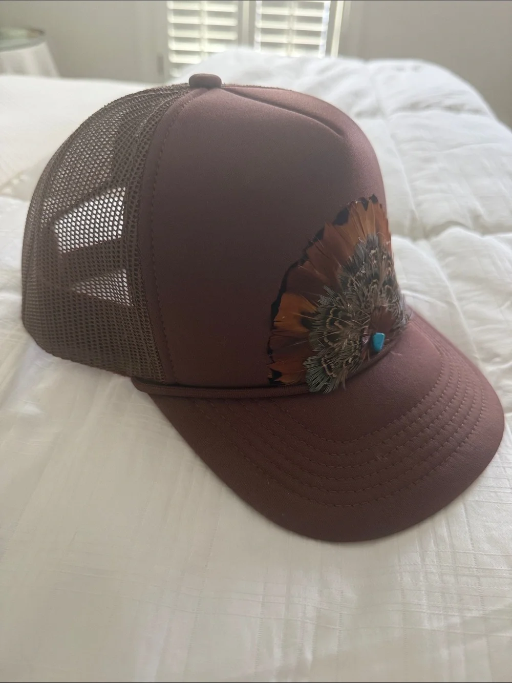 Women's Brown Feather Accent Trucker Hat with Turquoise Detail